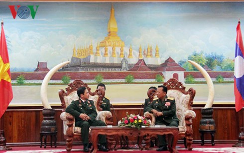 បង្កើនកិច្ចសហប្រតិបត្តិការការពារជាតិពង្រឹងទំនុកទុកចិត្តនិងកិច្ចសហប្រតិបត្តិការលើគ្រប់វិស័យវៀតណាម-ឡាវ - ảnh 1